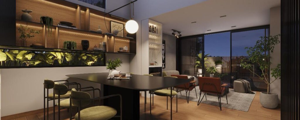Interior de Gemma TownHouses con cocina integrada, mobiliario moderno, iluminación cálida y amplios ventanales.